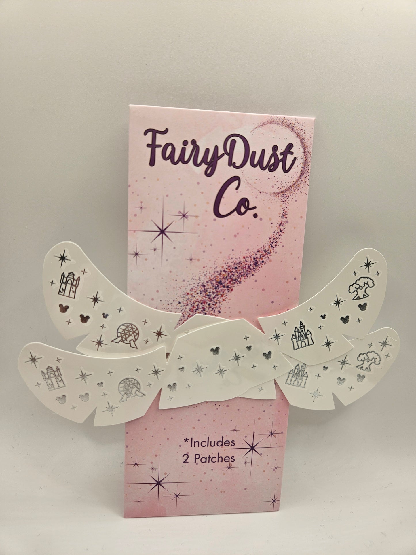 disney tattoo with park icons